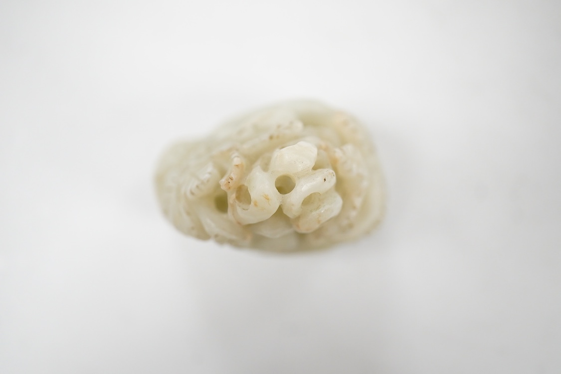 A Chinese pale celadon jade 'deer' pebble carving, 7cm high